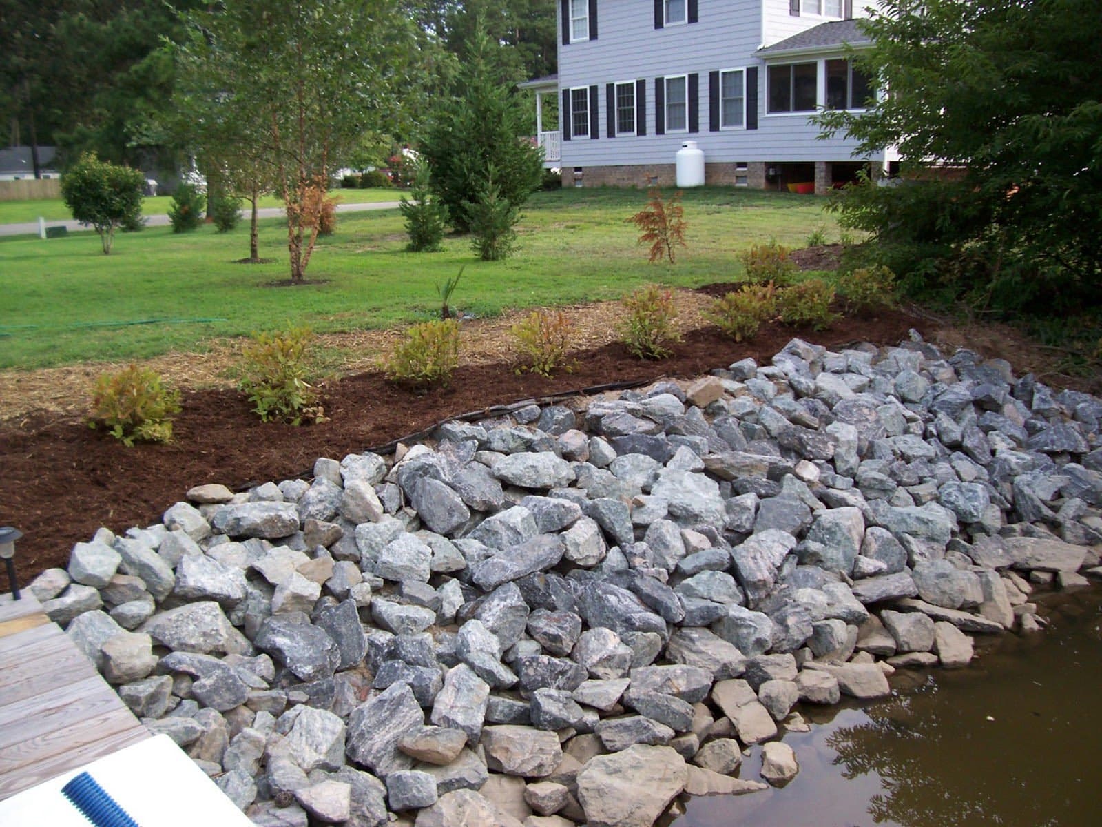 How Does Rock Armoring Prevent Shoreline & Hillside Erosion